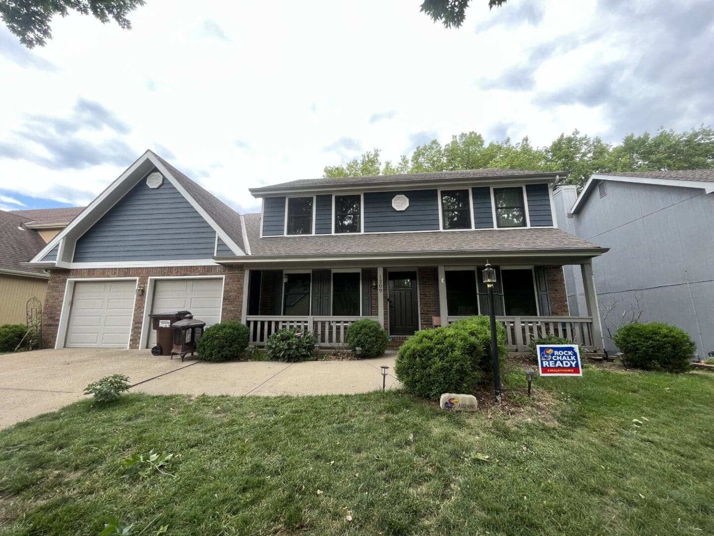 A house with a lot of grass in front