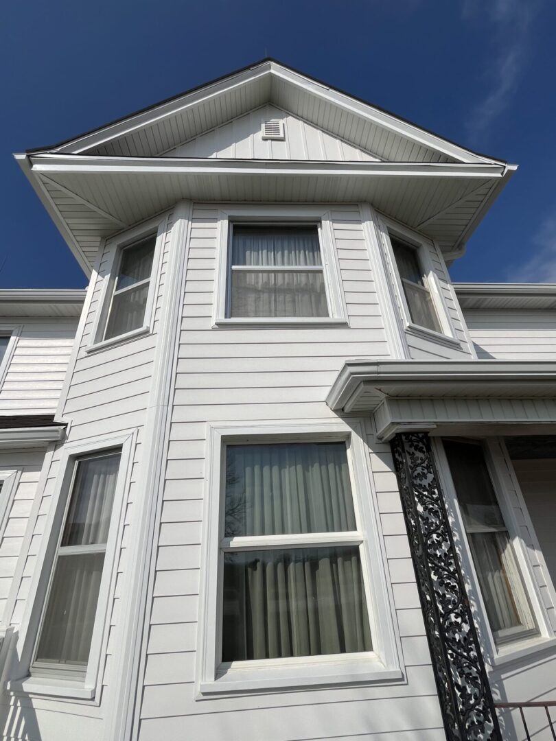 Close up of White House new window and siding